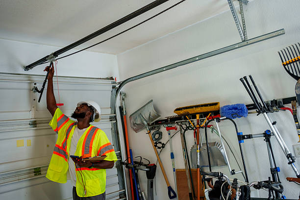 Professional Garage Door Panel Replacement technician working in Keweenaw County County, MI